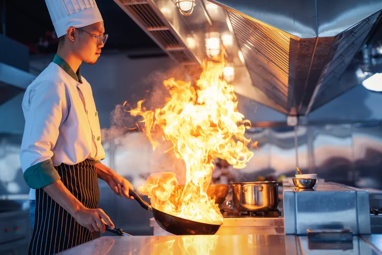 Chef cooking with gas